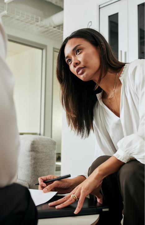 Woman Signing Paper